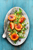 Caramelised apricots with goat's cheese on pesto couscous