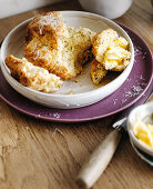 Scones with butter and grated cheese