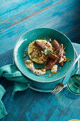 Grilled Baharat lamb fillets and couscous with dates