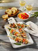 Mediterranean chicken leg skewers with peperonata