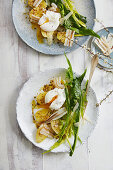 Dandelion salad with poached egg and bacon