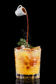 Espresso tonic with orange syrup and thyme
