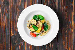 Roasted aubergine with peppers, spinach and buckwheat