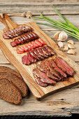 Various sliced air-dried meats and sausages