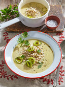 Creamy pearl barley soup with leek and parsley