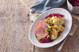 Pork loin with potato dumplings and red cabbage