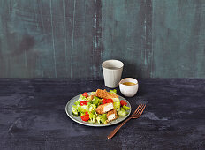 Salad with sesame and feta sticks