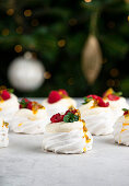 Mini pavlovas with mascarpone, raspberries and passion fruit