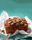 Spiced pumpkin molasses cake with pumpkin seeds