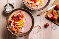 Smoothie bowl with fruit and coconut chips