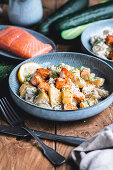 Braised cucumbers with salmon and dill