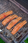 Salmon fillets in a grid on the grill