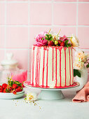 Festive sponge cake with buttercream and strawberries