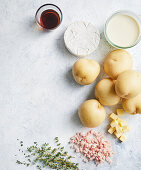 Ingredients for creamy potato fondue with camembert