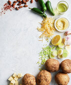 Ingredients for potato soup with leek and cheese