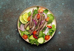 Thai beef salad with vegetables and mint