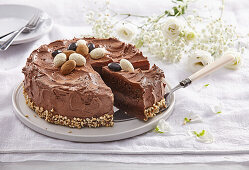 Chocolate cream cake with chocolate almonds