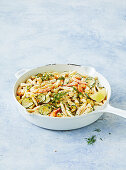 Penne with prawns and courgettes in a cream sauce