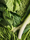 Green vegetables - peas, beans, leeks and cabbage leaves