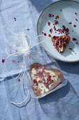 Homemade chocolate hearts with dried flowers