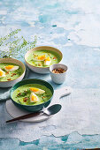 Cold cucumber soup with hard-boiled egg and walnuts