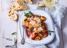 Gnocchi with chicken and sage in tomato sauce