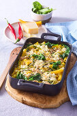 Penne casserole with tuna, spinach and parmesan