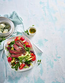 Salad with flank steak, avocado and gorgonzola