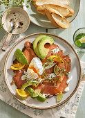 Smoked salmon with avocado, egg and horseradish sauce