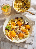 Sweet gnocchi with apricots, nuts and raisins