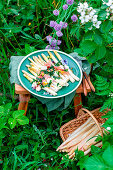 White asparagus with arugula vinaigrette and prosciutto