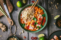 Curry with salmon and rice noodles