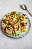 Roasted cauliflower with spring onions, curry leaves and gunpowder spice mix