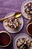 Chocolate tartlets with almond flakes