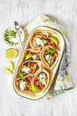 Baked tortillas with Mexican vegetables and coriander yogurt