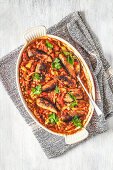 Sausage and lentil casserole with peppers