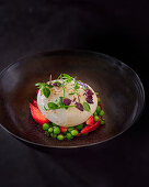 Burrata with peas, strawberries and microgreens