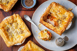 Chicken and lentil ragout with potatoes in puff pastry