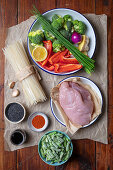 Ingredients for rice noodles with chicken and vegetables