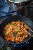 Soy noodles with tofu, vegetables and peanuts