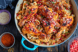 Harissa chicken drumsticks with cauliflower