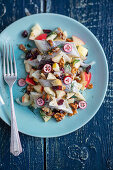 Herring salad with apples and walnuts