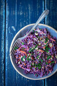 Red cabbage salad with carrots and hazelnuts