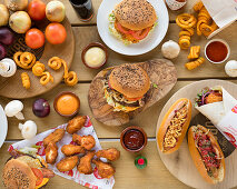 Various burgers, hot dogs, chicken wings and twister fries