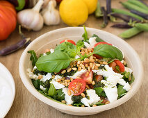 Caprese salad with tomatoes, mozzarella and basil