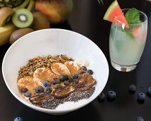 Breakfast bowl with yoghurt, banana, blueberries and chia seeds