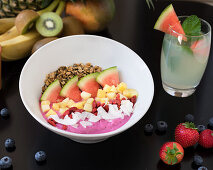 Acai bowl with watermelon, mango and granola