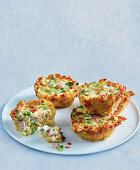 Cheesy potato crust muffins with kale and mushrooms