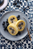 Sponge roll with blueberry and cream filling