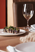 Aubergine and mushroom terrine on a skewer with white wine